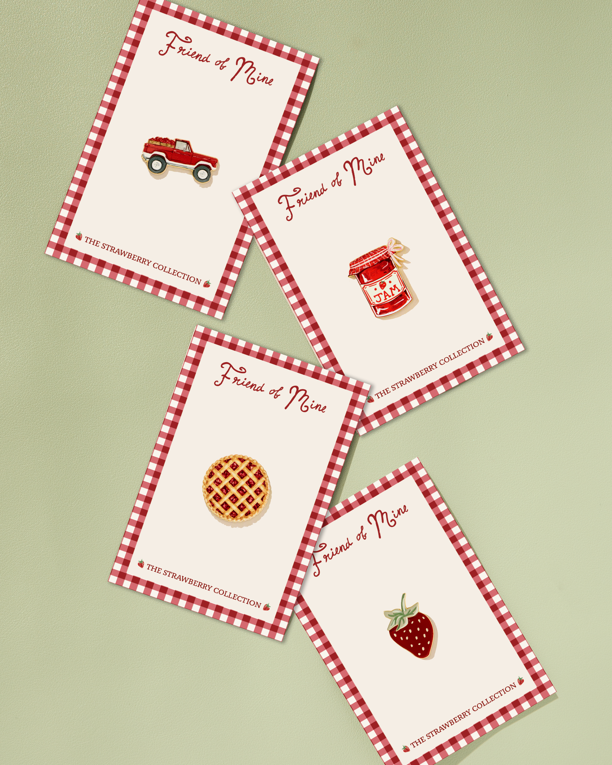 Strawberry needlepoint collection flatlay